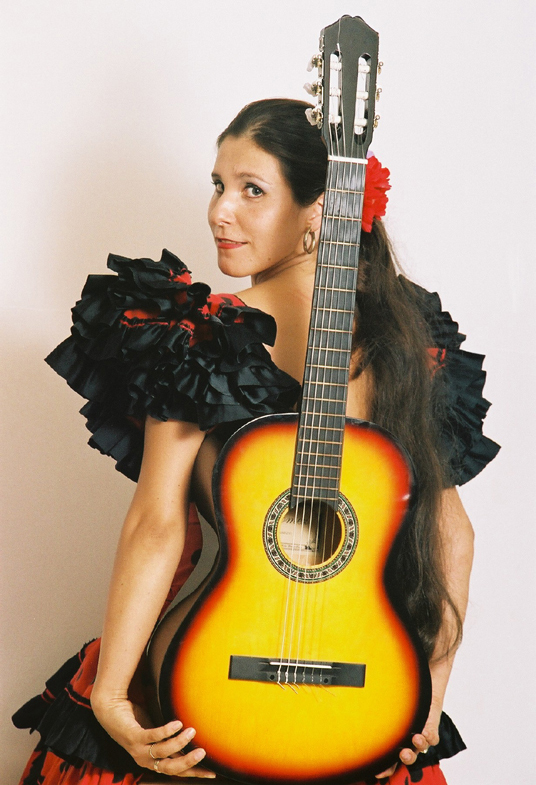 Spaanse thema feest gitariste zangeres Laura Rivas